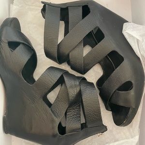 Black Italian Napa leather sandals.